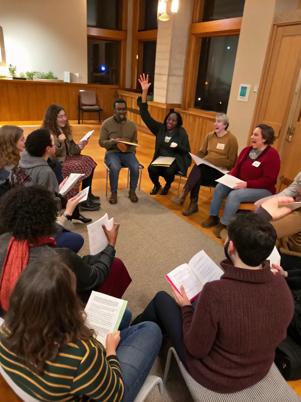 A photograph of a group of parents attending a workshop on understanding IEPs, led by a facilitator.